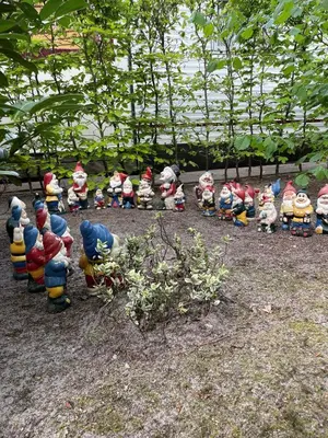 a group of stuffed animals sitting in a garden at Duynparc Soest in Soest