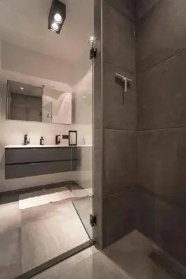 a bathroom with a shower and a sink at Sack-Time fashion boutique hotel 6 & 7 in Zandvoort