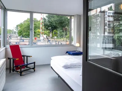 a small room with a bed and a window at SWEETS - Hortusbrug in Amsterdam