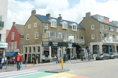 a group of buildings on a city street at Maisonnette Indysenne in Zandvoort