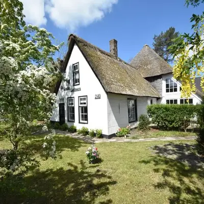 Luxuriously restored farmhouse with trendy interior close to sea and forest