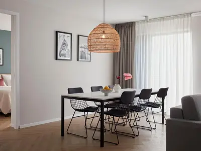 a dining room with a table and chairs at Numa Amsterdam Docklands in Amsterdam