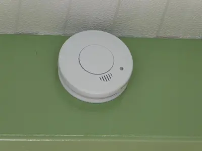a white object with a smiley face on a green wall at Beemster Oase in De Beemster