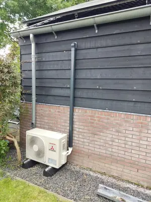 a building with a heater next to a wall at Beemster Oase in De Beemster