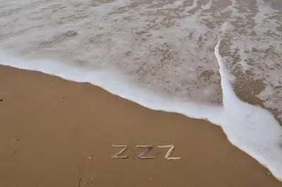 a new year is written in the sand on the beach at Strandhotel Zoomers in Castricum