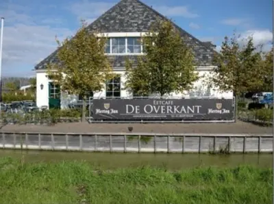 a house with a sign in front of it at Villa Pantano in Berkhout