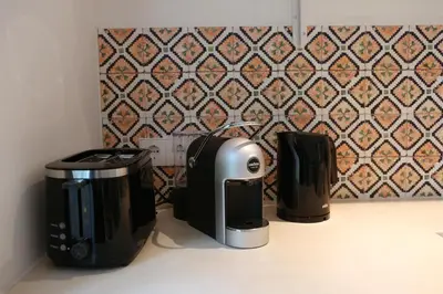 two toasters sitting on a counter in a bathroom at Sunny Guesthouse in Bergen