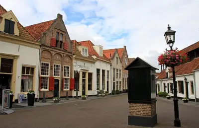 a street in a town with a street light and buildings at Holiday Home Zeewolde in Zeewolde