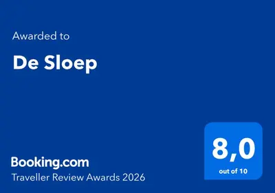 a blue screen with the text be sleep on it at De Sloep in Bergen