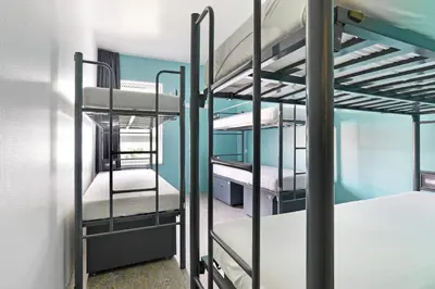 a group of bunk beds in a dorm room at Hans Brinker Hostel Amsterdam in Amsterdam