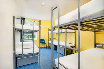 a room with bunk beds in a dorm room at Hans Brinker Hostel Amsterdam in Amsterdam