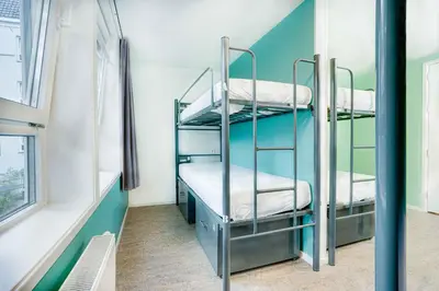 a bunk room with two bunk beds in it at Hans Brinker Hostel Amsterdam in Amsterdam