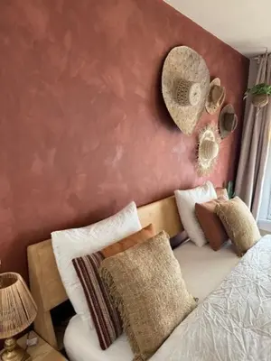 a bedroom with a bed and a mirror on the wall at Toast by night in Haarlem