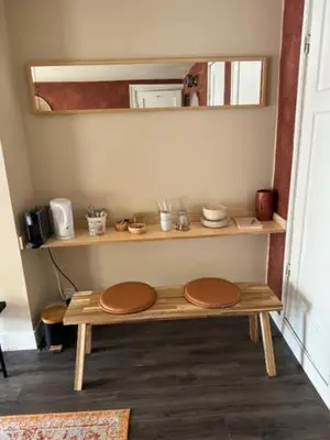 a room with a wooden shelf with plates on it at Toast by night in Haarlem