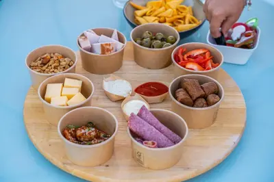 a plate of food on a table with different foods at EuroParcs de Woudhoeve in Egmond aan den Hoef