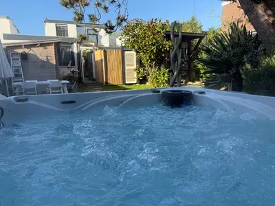 a large plunge pool in the backyard of a house at Zandvoort Paradise Boutique Chambre in Zandvoort