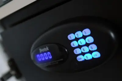 a close up of a remote control with blue numbers at Blue Mansion Hotel in Aalsmeer