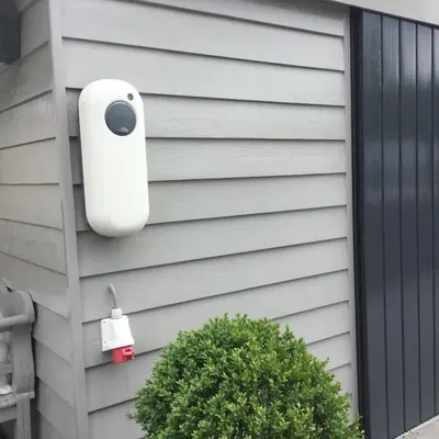 a security camera on the side of a house at Aan de Vecht in Nederhorst den Berg