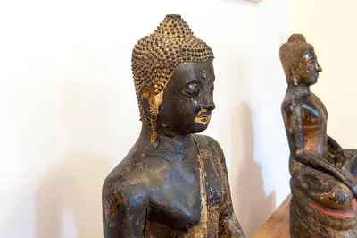a statue of two people sitting next to each other at Bed & Breakfast of Art in Amsterdam