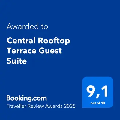 a screenshot of a cell phone with the text awarded to central rotatory reference guest at Central Rooftop Terrace Guest Suite in Amsterdam