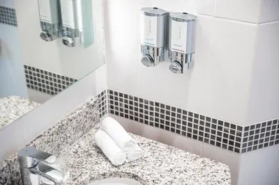 a bathroom with a sink and a toilet in it at Hampton By Hilton Amsterdam Arena Boulevard in Amsterdam