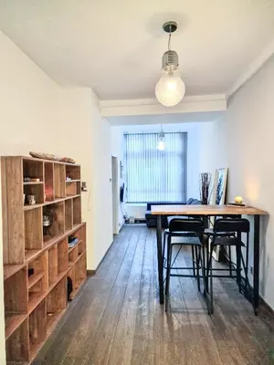 a dining room with a table and some chairs at A cozy place in Amsterdam in Amsterdam
