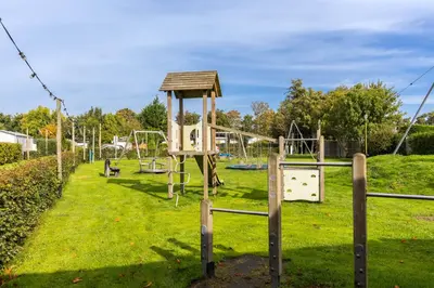 a park with a playground with a slide at Ferienhaus Weitblick in Sint Maarten