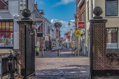 a city street with a wrought iron gate at casa Heemskerk in Noordwijk