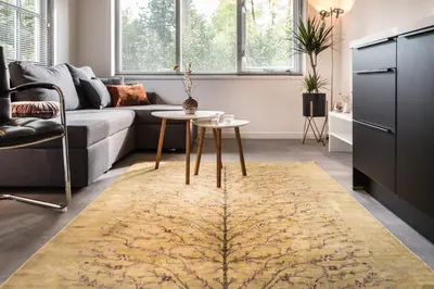 a living room with a couch and a table at Boutique Appartement-Hotel Villa Juttershof in Bergen