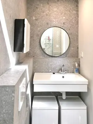 a bathroom with a sink and a mirror at BB in Amsterdam, 35m2, gratis parkeren in Amsterdam