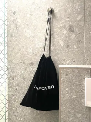 a black bag hanging on the side of a wall at BB in Amsterdam, 35m2, gratis parkeren in Amsterdam