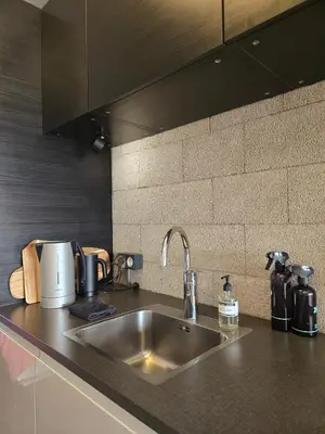 a kitchen with a sink and a counter top at BB in Amsterdam, 35m2, gratis parkeren in Amsterdam