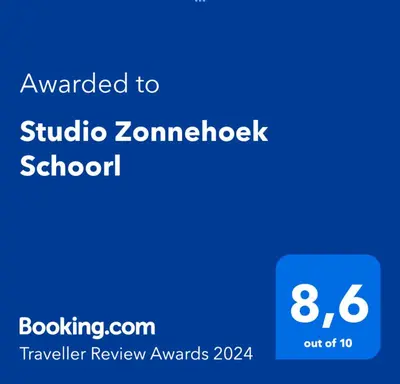 a screenshot of a phone screen with the text awarded to studio zombiecheck school at Studio Zonnehoek Schoorl in Schoorl