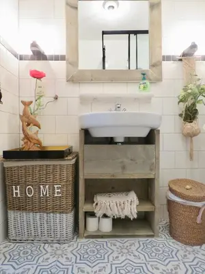 a bathroom with a sink and a mirror at Casa duna close to the beach, city centre, dunes and parking area in Zandvoort
