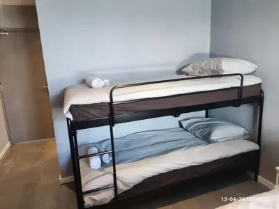 a couple of bunk beds in a room at House of Tulips in Hillegom