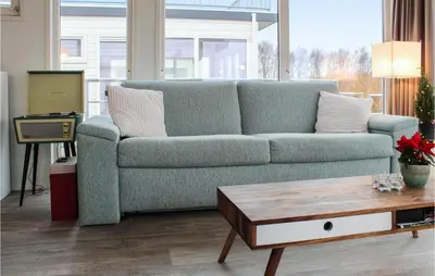 a living room with a couch and a coffee table at Nice Ship In Aalsmeer With Kitchen in Aalsmeer