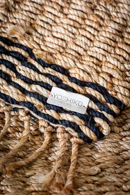 a pile of rope with a tag on it at Studio Puuur in Zandvoort
