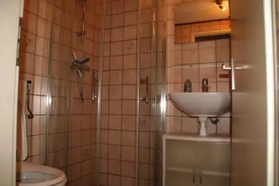 a bathroom with a sink and a toilet at Rekerlanden 173 in Schoorldam