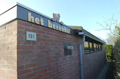 a brick building with a sign that reads heat residential at Rekerlanden 161 in Schoorldam