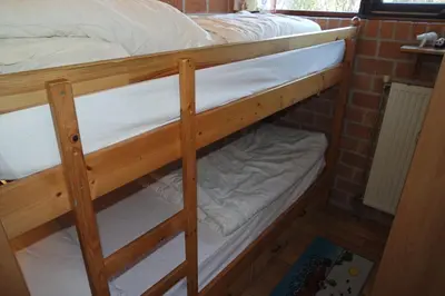 a couple of bunk beds in a room at Rekerlanden 161 in Schoorldam