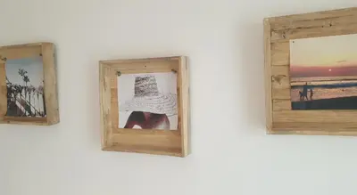 two pictures are hanging on a wall at Sea Cottage Zandvoort in Zandvoort