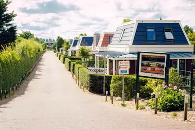 a walkway in front of a building at Bungalow 6p in Noordwijk