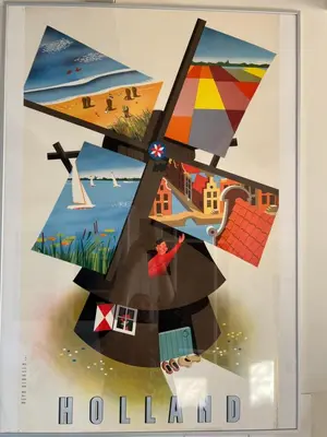 a poster of a woman flying a kite at Romantic Dutch hideaway in Jisp