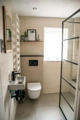 a bathroom with a toilet and a sink at huisje de Strandjutter in Katwijk aan Zee