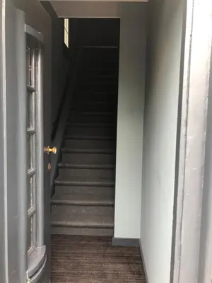 a staircase in a building with a stair case at The Rock in Zandvoort