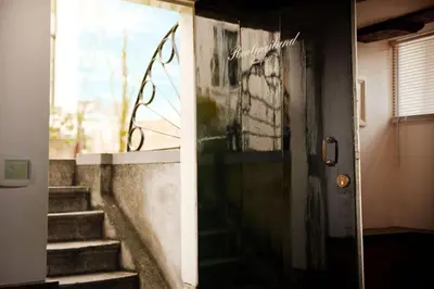 an open door to a stairway with a stair case at Realeneiland Bed & Breakfast in Amsterdam