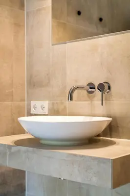 a white sink on a counter in a bathroom at The Slow in Zuidoostbeemster