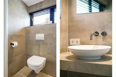 a bathroom with a sink and a toilet at The Slow in Zuidoostbeemster