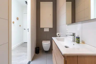 a bathroom with a sink and a toilet at Utrecht City Apartments - Maliesingel in Utrecht