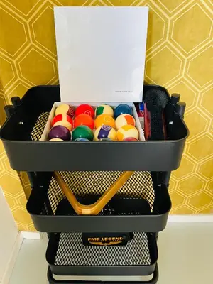 a black container filled with different colored balls at Tulpenhoek in Akersloot